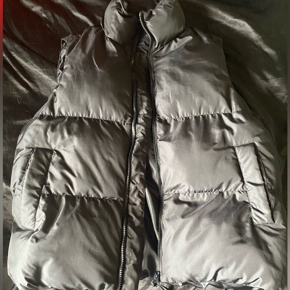 black puffer jacket with no sleeves